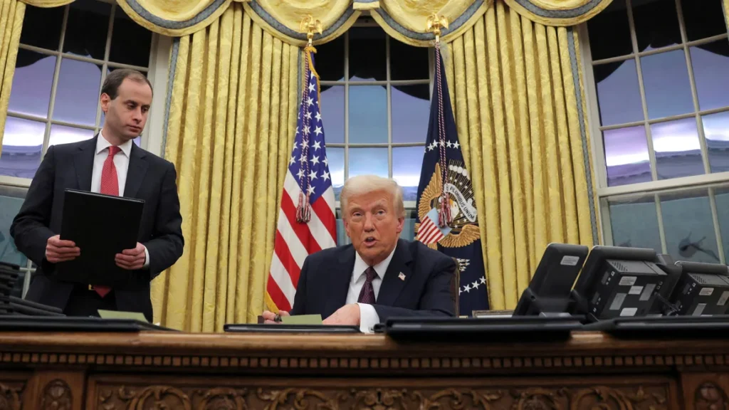 President Donald Trump speaks Monday as he issues executive orders and pardons from the Oval Office of the White House. Carlos Barria/Reuters