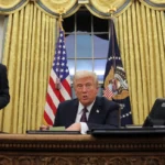 President Donald Trump speaks Monday as he issues executive orders and pardons from the Oval Office of the White House. Carlos Barria/Reuters