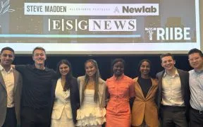 image of the Triibe team on stage during event