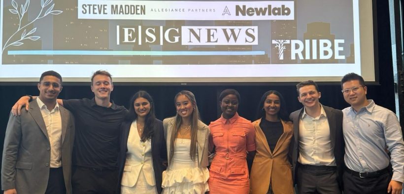 image of the Triibe team on stage during event