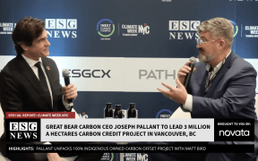 ESG News studio with host Matt Bird and guest Joseph Pallant sitting in front of Climate Week NYC backdrop.