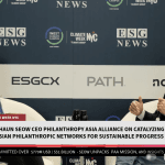 Image of ESG News studio with Shaun Seow and Michelle Li speaking