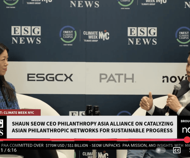 Image of ESG News studio with Shaun Seow and Michelle Li speaking