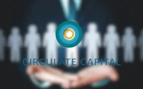 Businessperson presenting Circulate Capital Asia Fund logo, with colleagues in background, highlighting circular economy focus.