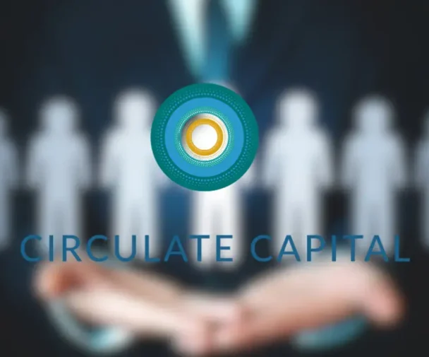 Businessperson presenting Circulate Capital Asia Fund logo, with colleagues in background, highlighting circular economy focus.